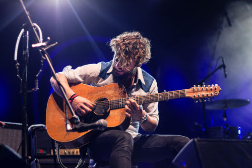 Songwriter John Butler playing his custom-made 11-string Maton guitar